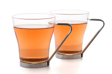 Two glass cups of black tea