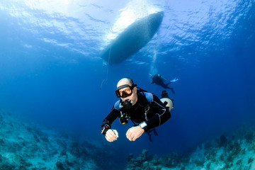 Sidemount SCUBA Diving below a dive boat