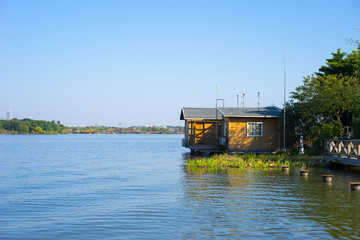 wood house by the lake