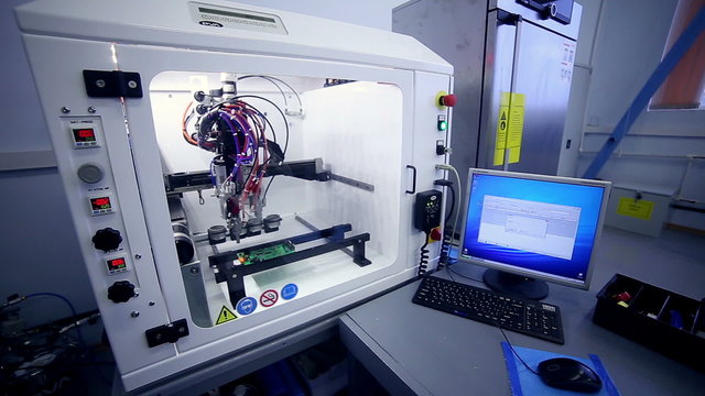Surface Mount Technology Smt Machine places elements on circuit boards. HD.