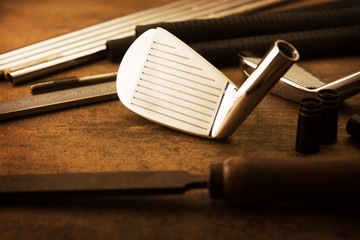 Custom golf club making. Golf club iron head ready for assembly, Focus on clubface.