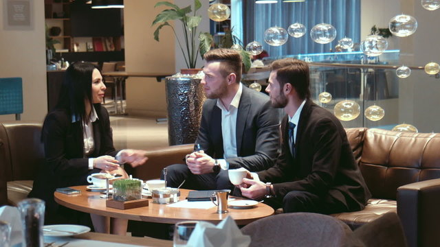 businessmen have tea in hotel