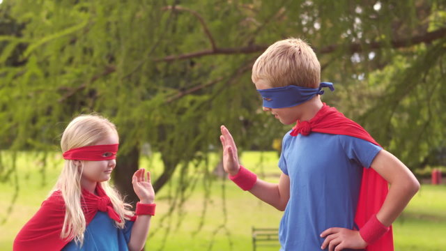 Children pretending to be superhero