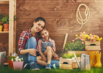 girl helps her mother