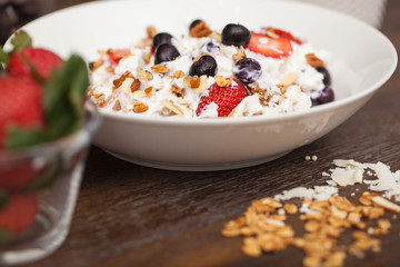 Bowl of yogurt with fruit up close