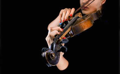 Woman's hands playing the violin