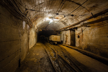 Fototapeta na wymiar Underground gold mine ore tuneel with rails Berezovsky mine Ural