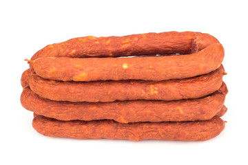 Smoked sausages on white background