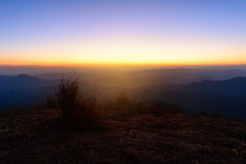 Beautiful mountain layers with mist and sunlight.