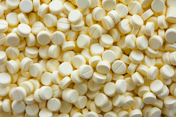 Many medication tablets and pills