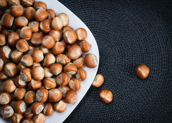 hazelnuts on black background