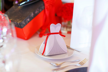 Elegant table set in red black white for wedding 