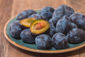 Fresh plums on a plate