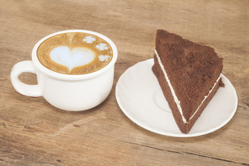 coffee cup and chocolate dessert cake