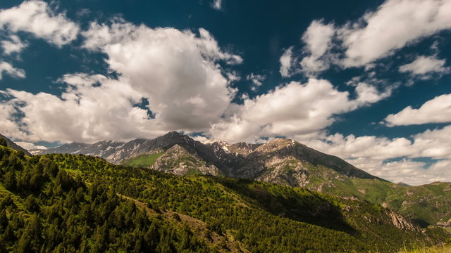 4K Timelapse. Beautiful clouds high in mountains Sairam-Su, Tyan-Shan, Kazahkstan