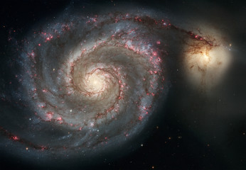 Whirlpool Galaxy. Graceful arms of the majestic spiral galaxy. - 103079639