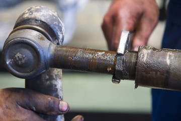 Mechanic wrench spun the old nut