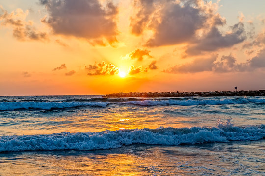 Beautiful Mediterranean sea sunset at the beach in Tel Aviv Israel.