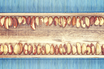 Brazil nuts on a wooden background