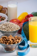 View of bowl of cereals, fruit salad and food