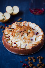 Apple pie on a blue wooden table