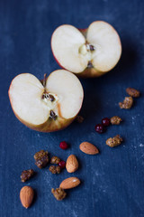 Slices of apple on blue background