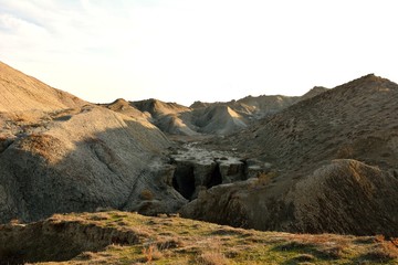 Channels and caves eroded in mud in hills in Azerbaijan. Lokbatan is a small town 15km south west of Baku, Azerbaijan, and is next to a large mud volcano
