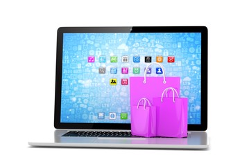 laptop and  shopping pags on white background