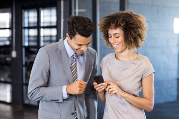 Businessman talking to young woman