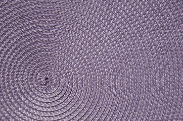 Violet rattan woven mat closeup