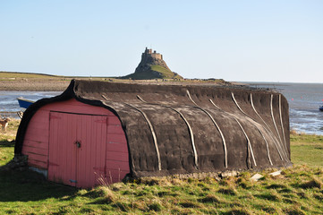 A traditional boat shed on the island of Lindisfarne also known as Holy Island in Northumberland ...