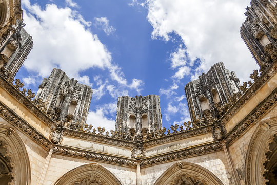 Batalha, Portugal - July, 2015: Looking up, inside the Unfinished Chapels (Capelas Imperfeitas) of the Batalha Monastery. A masterpiece of the Gothic and Manueline. Unesco World Heritage.