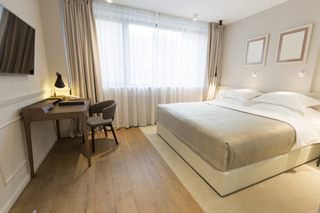 Interior of a double hotel bedroom in the morning