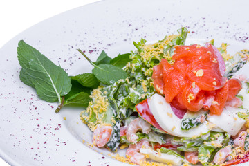 Salmon salad with prawns