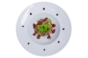 Salad with eggplant and avocado, top view, isolated