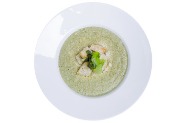 Broccoli cream soup with roasted rusks, top view