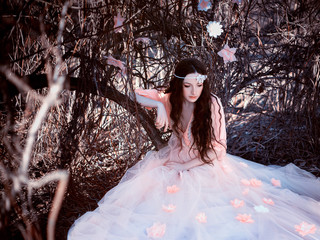 Women spring come after  a long winter and awakens the nature of their presence,lady in a dress...