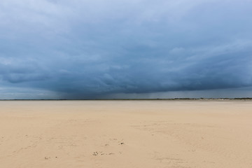 Fototapeta na wymiar Unwetter am Strand von St Peter Ording, Nordsee