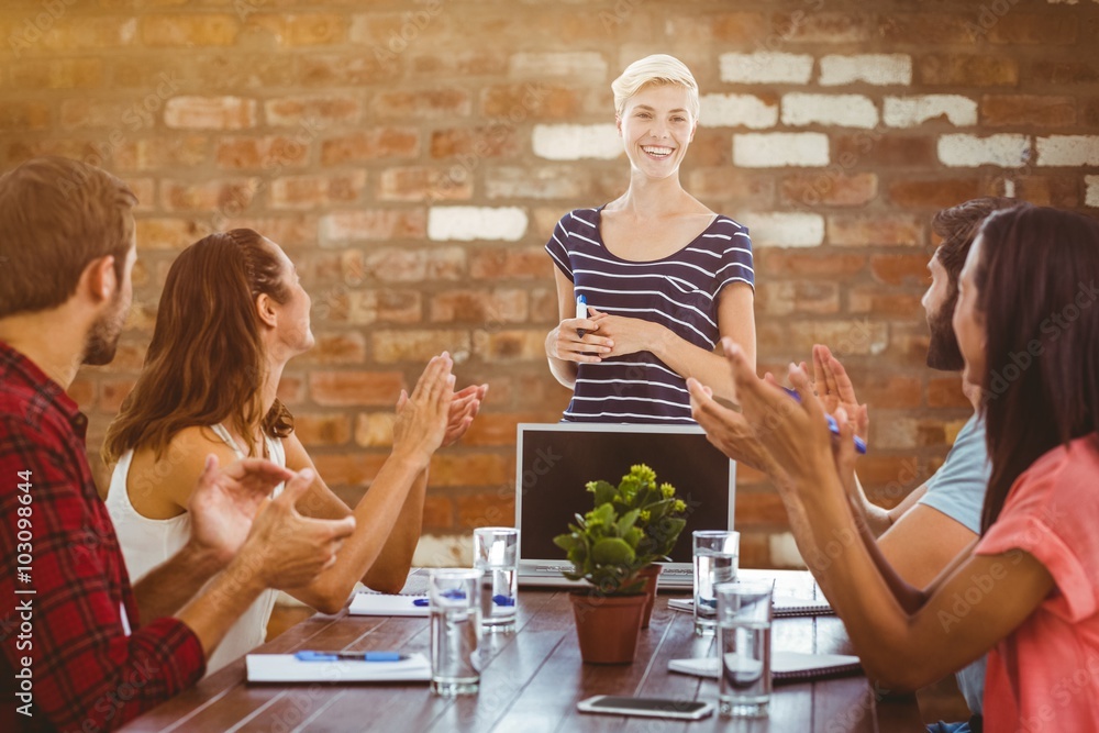 Poster composite image of colleagues clapping hands in a meeting