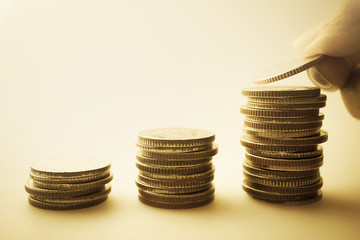 rows of coins and account for finance and banking concept

