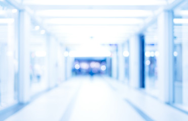medical blurred background, empty hospital corridor in neon blue
