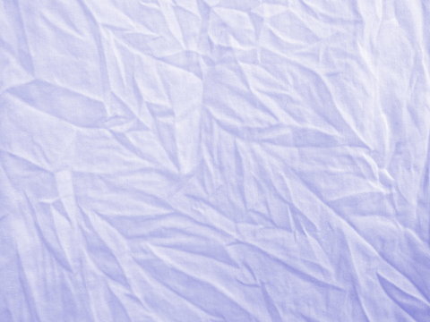 wrinkled light blue cloth
