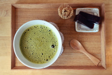 Japanese hot green tea and wire whisk made of bamboo