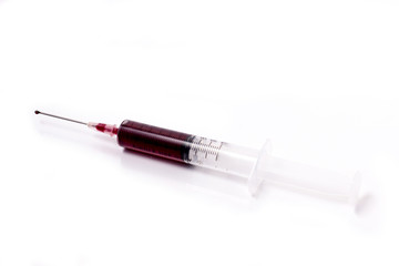 syringe and blood