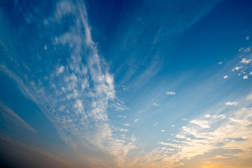 Evening sky with clouds and sun