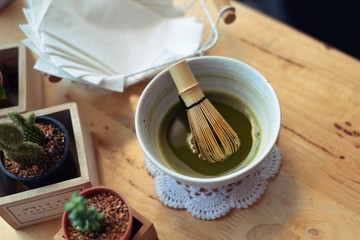 Japanese hot green tea and wire whisk made of bamboo