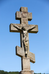 Old, abandoned stony Orthodox crosses