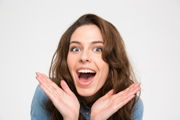 Closeup portrait of happy excited young woman