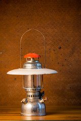 Still life art photography concept with oil lantern on old  stee