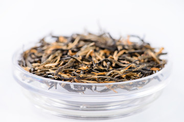 close-up of spilled tea Golden needle with a red-haired (Golden